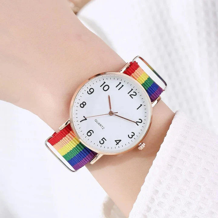 A stylish rainbow-coloured women's wristwatch with a quartz movement and an alloy case for elegant and durable design.