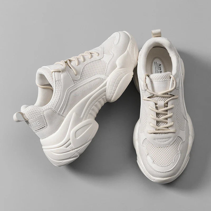Stylish white platform casual shoes for women, featuring a round toe, thick heel, and comfortable, supportive design.