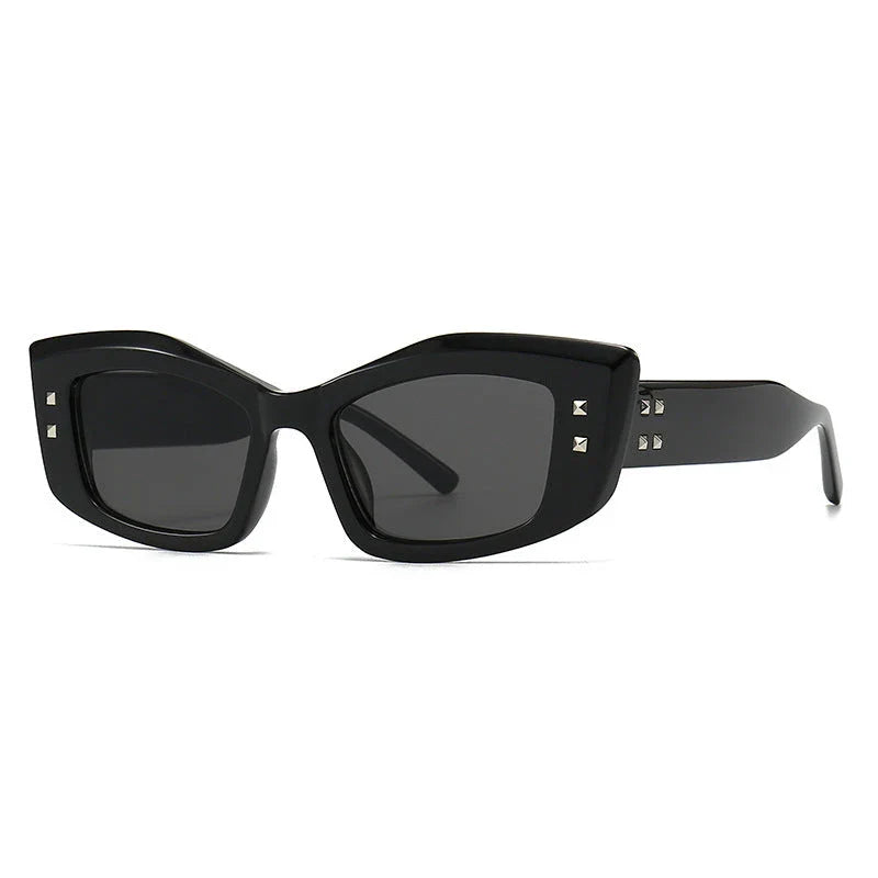 Retro cat eye sunglasses with rivet details, offering a stylish and protective eyewear solution.