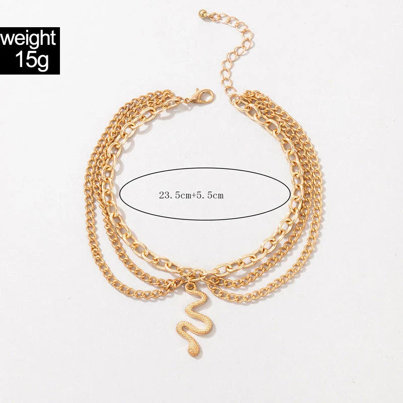 A stylish gold boho anklet with delightful tassels, starfish, and heart charms, perfect for summer outings and everyday wear.