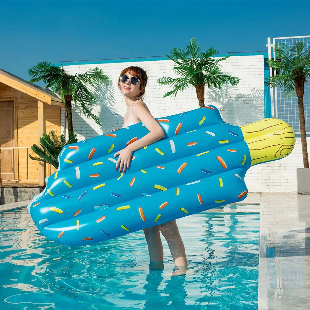 Premium inflatable swim float in a vibrant pink and blue ice cream design, providing comfortable and stylish relaxation on the water