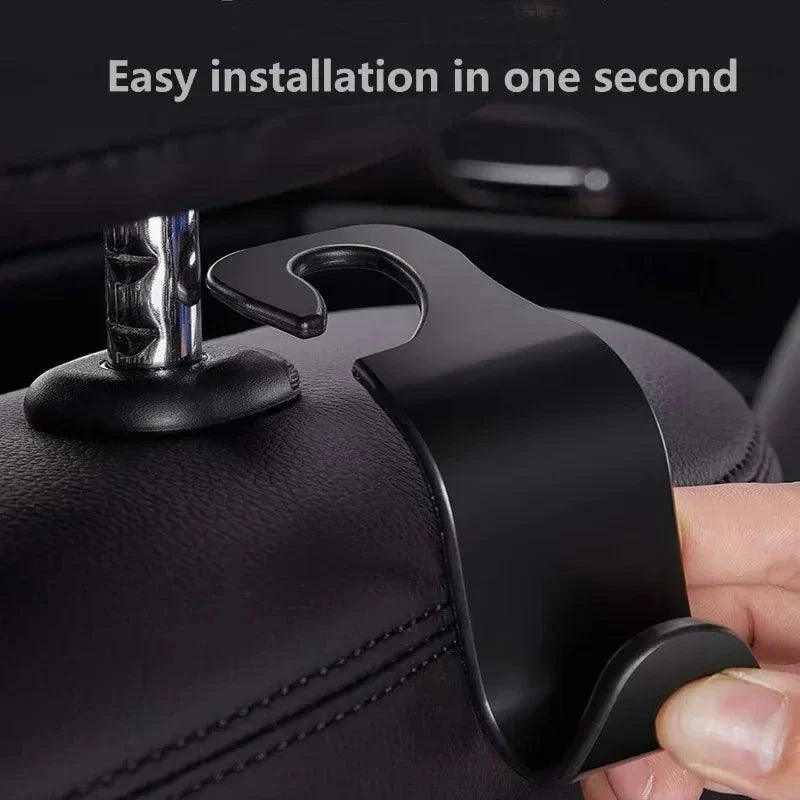 Premium 4-pack car seat headrest hooks in black, designed to organise and declutter UK drivers' vehicles