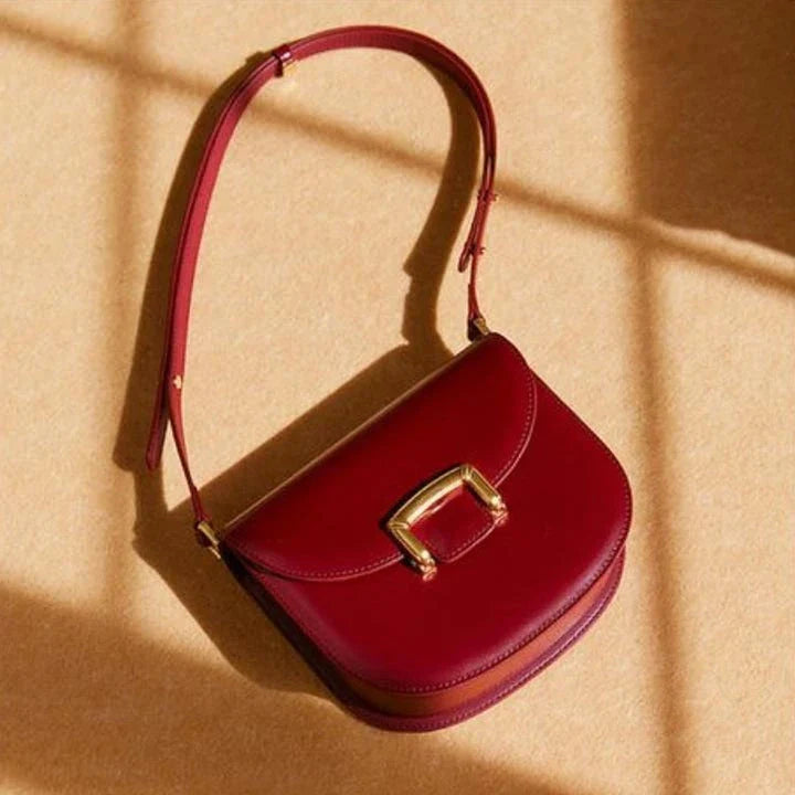 Premium high-end British wedding shoulder bag in brown, with a unique saddle shape design and hardwearing leather exterior
