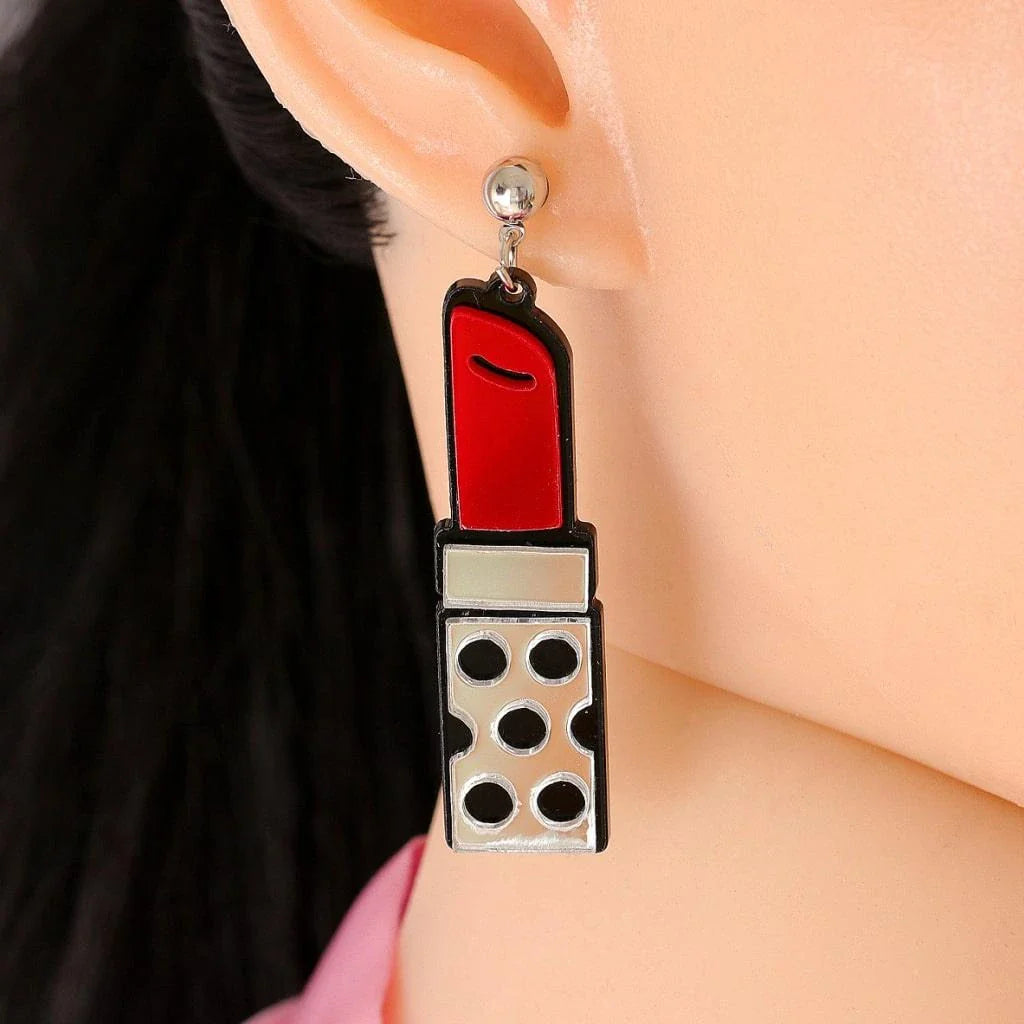 Trendha Red Lipstick Earrings: Striking resin earrings in a bold lipstick design, perfect for adding a touch of modern flair to any outfit.