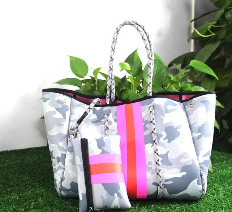 A neoprene beach bag in a stylish design, perfect for British summer adventures at the coast