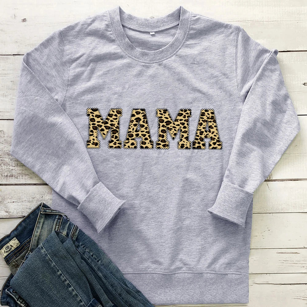 Leopard print sweatshirt in a range of colours, including white, pink, yellow, grey, green, black, and wine red. Relaxed, oversized fit for comfort and style.