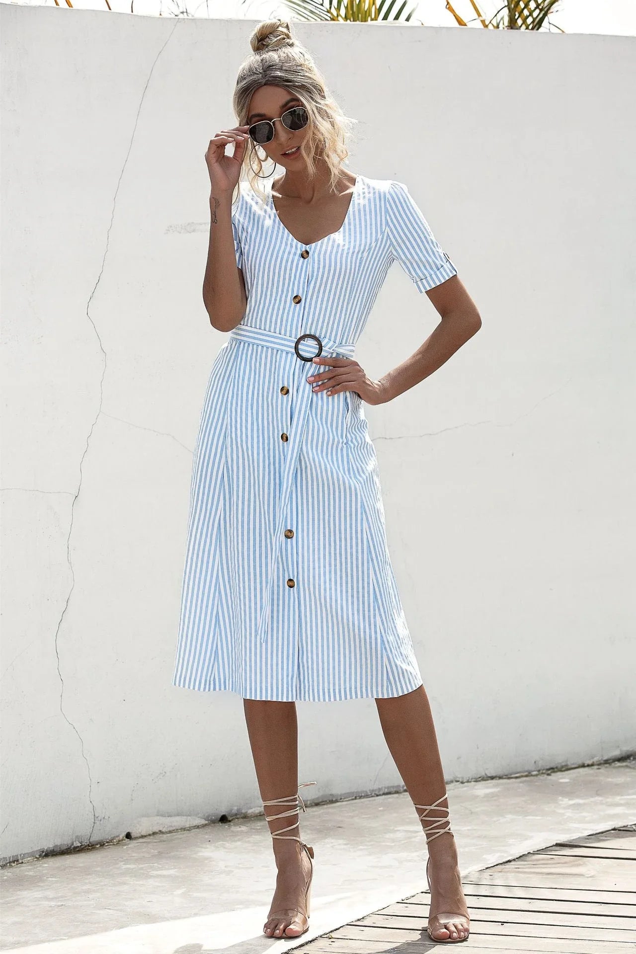 Stylish lace-up button dress in a soft, breathable cotton-blend fabric with a flattering middle waist silhouette