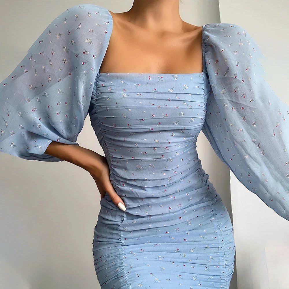 Stylish high-waist open-back pleated dress in light blue chiffon fabric
