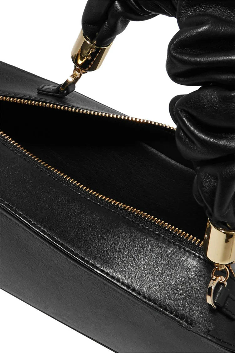 Sophisticated long shoulder diagonal bag with a sleek horizontal square design, made of durable synthetic leather and featuring a single shoulder strap for hands-free convenience.