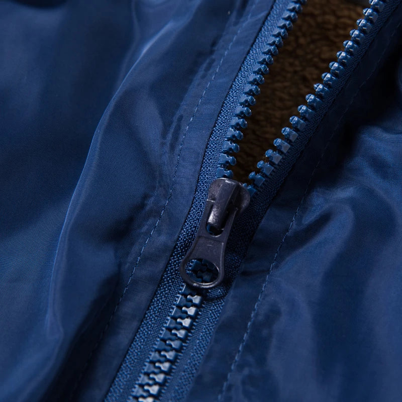 Men's slim-fit hooded jacket with camouflage print, zippered pocket, and premium chemical fibre blend fabric