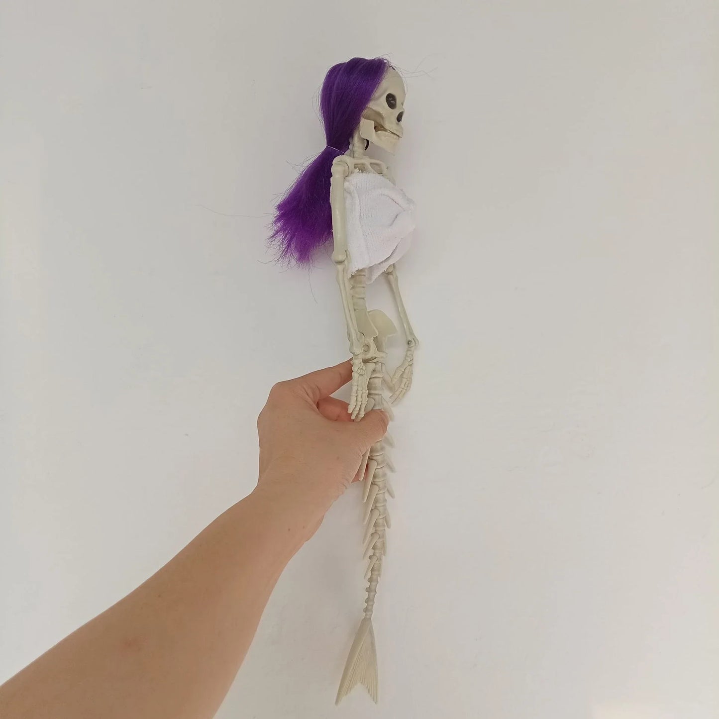 Mermaid bone pendant decoration in brown, dark purple, burgundy, and lake blue colours, ideal for Halloween outdoor courtyard displays