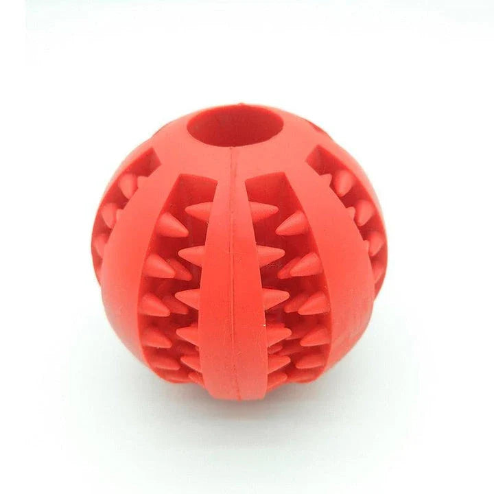 Premium natural rubber interactive ball for dogs in various colours, designed to provide mental stimulation and physical exercise.