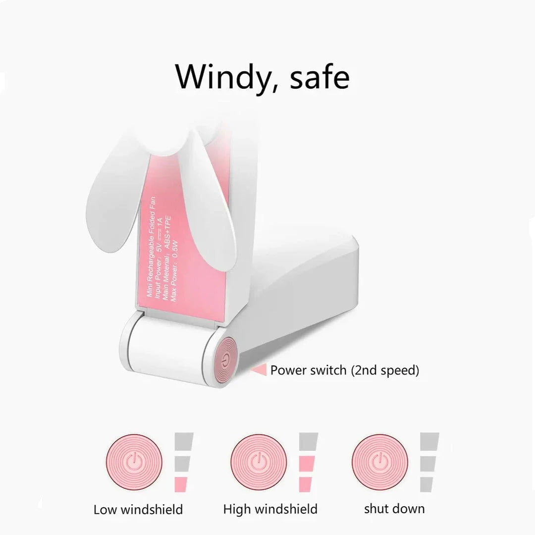 Compact rechargeable handheld fan in pink and green colours, providing powerful cooling on the move