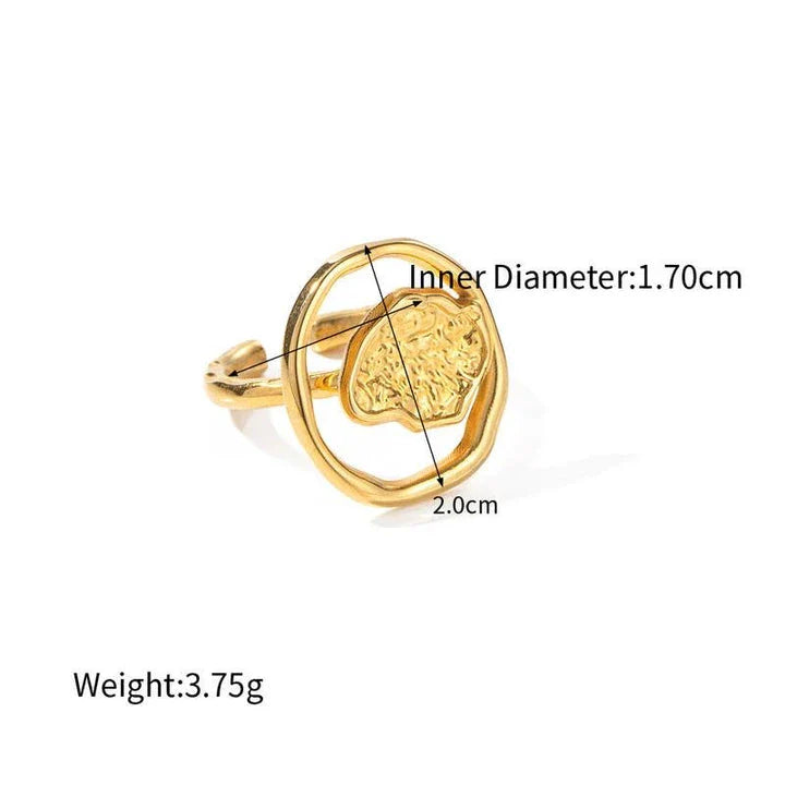Elegant 18K gold-plated stainless steel ring with intricate hollow-carved design and vintage-inspired charm