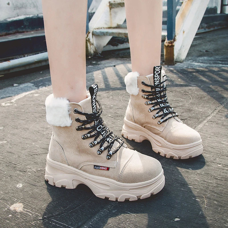 Stylish British platform boots with faux suede upper, lace-up closure, and wedge heel design