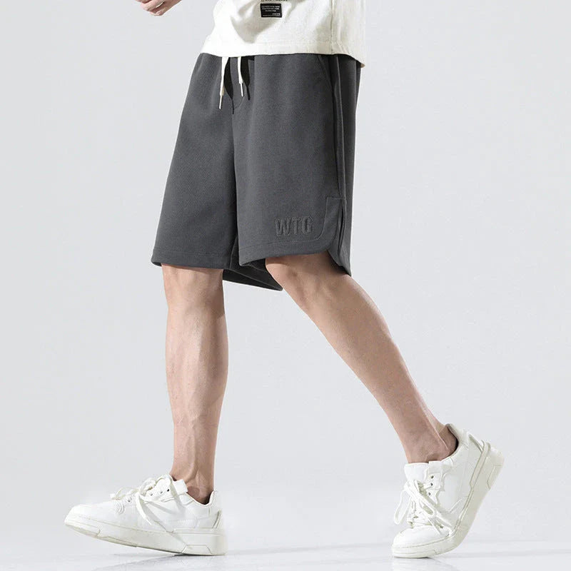 Premium British-made knitted sports shorts in a variety of classic colours, featuring an elastic waistband and loose, comfortable fit.