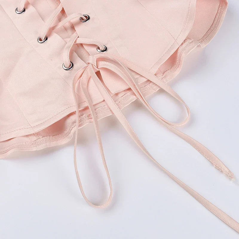 Stylish bow-accented waist back fashion in pink, made with premium polyester for a comfortable and flattering fit.