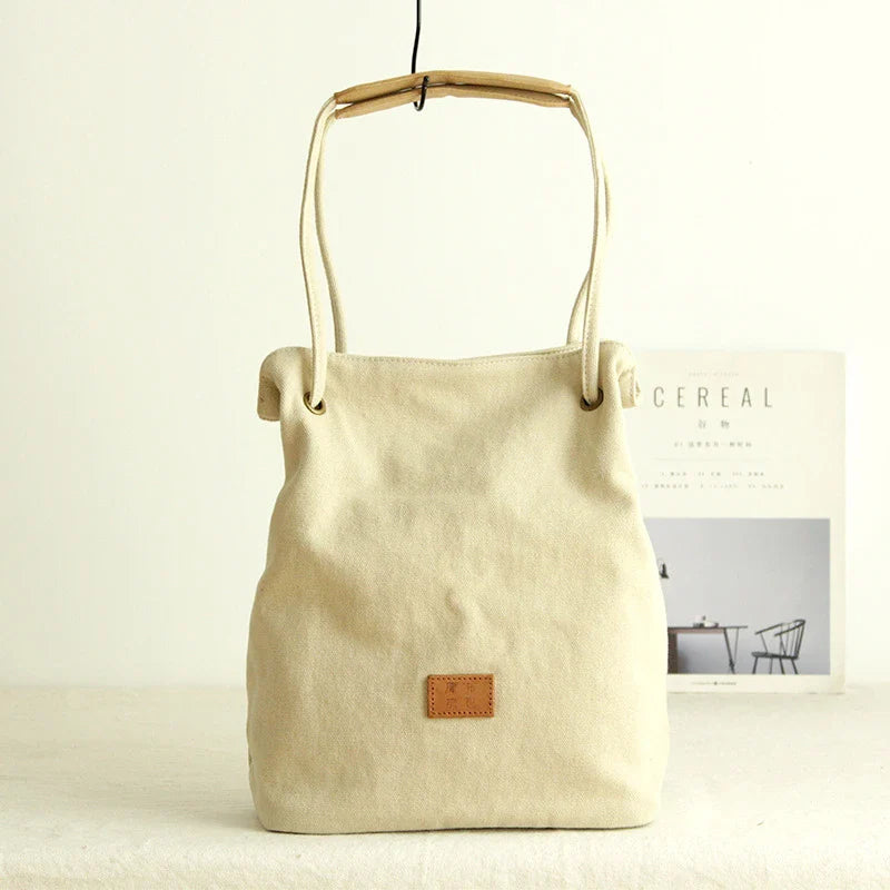 Premium canvas lattice shoulder bag in various colours, featuring a spacious design with secure zipper closure and adjustable strap for comfortable everyday carry
