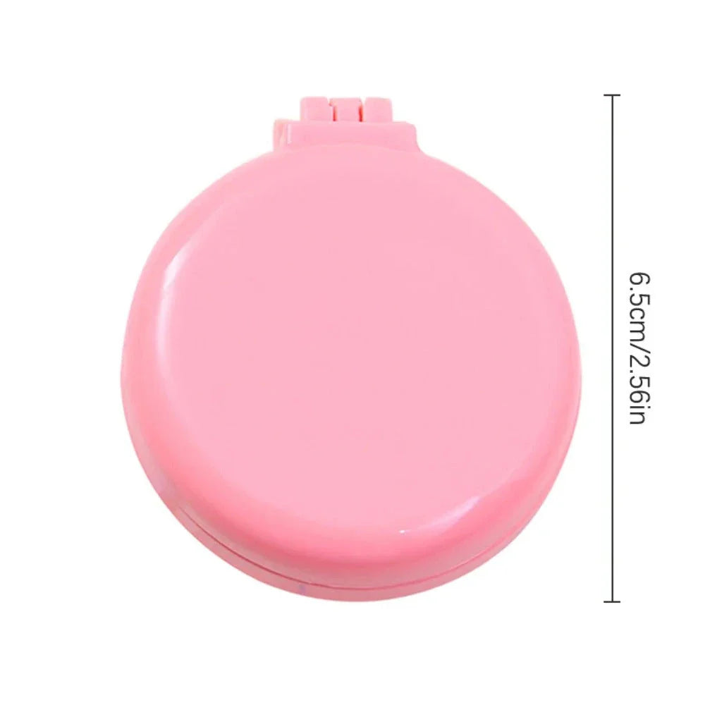 Compact folding hair comb with mirror, perfect for on-the-go touch-ups and styling for British customers