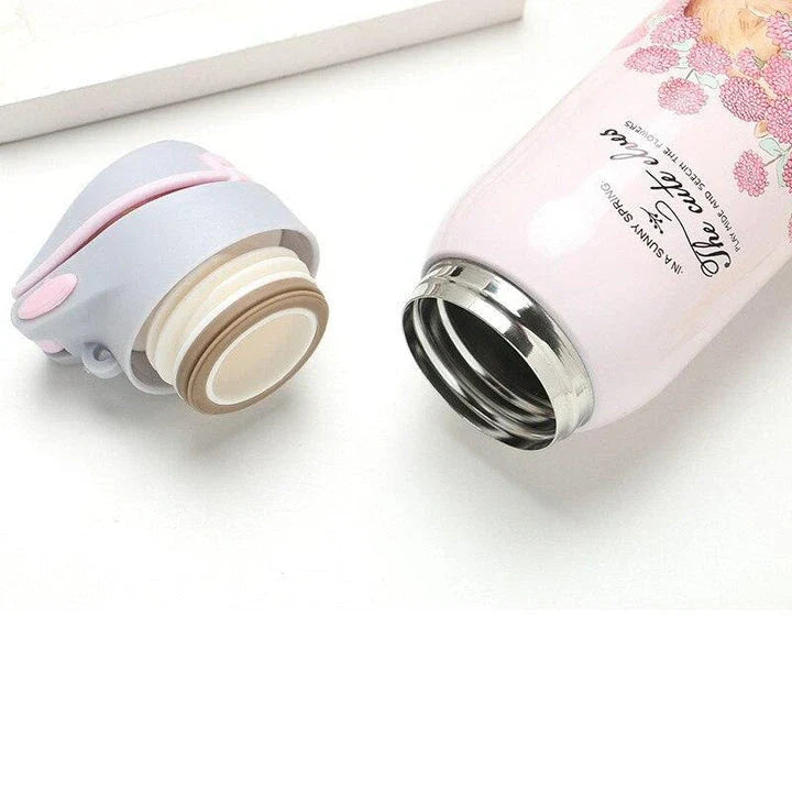 Stylish floral double-wall insulated water bottle with straw, made of high-quality stainless steel for long-lasting use and temperature control.