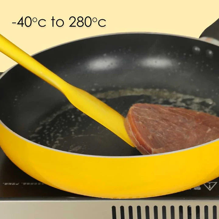 A set of two high-quality silicone spatulas in brown and yellow colours, designed for versatile cooking and baking tasks.