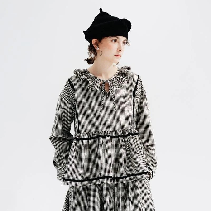 Autumn Elegance Checkered Shirt with Doll Collar, a stylish long-sleeved shirt in a classic black and white checkered pattern