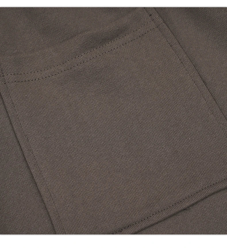 Premium loose-fit sports shorts with eye-catching printed patterns in black, khaki, and dark grey colours