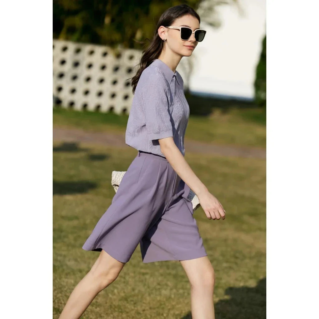 Elegant wide-leg shirred shorts for women, featuring a refined design and comfortable fit for the British summer