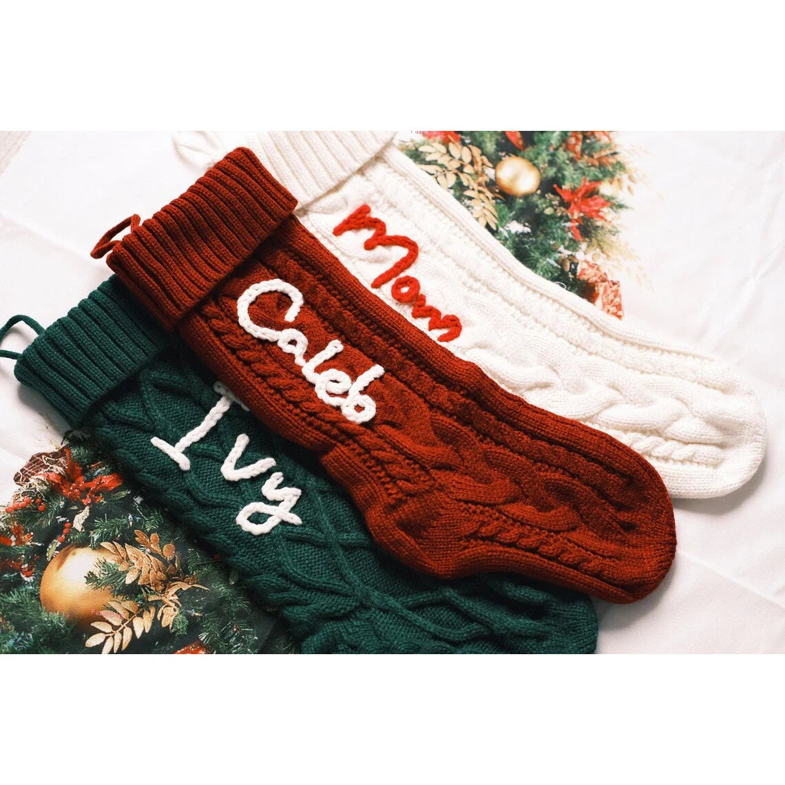Premium hand-embroidered Christmas socks in a variety of festive colours, featuring intricate machine embroidery for a touch of traditional British charm.