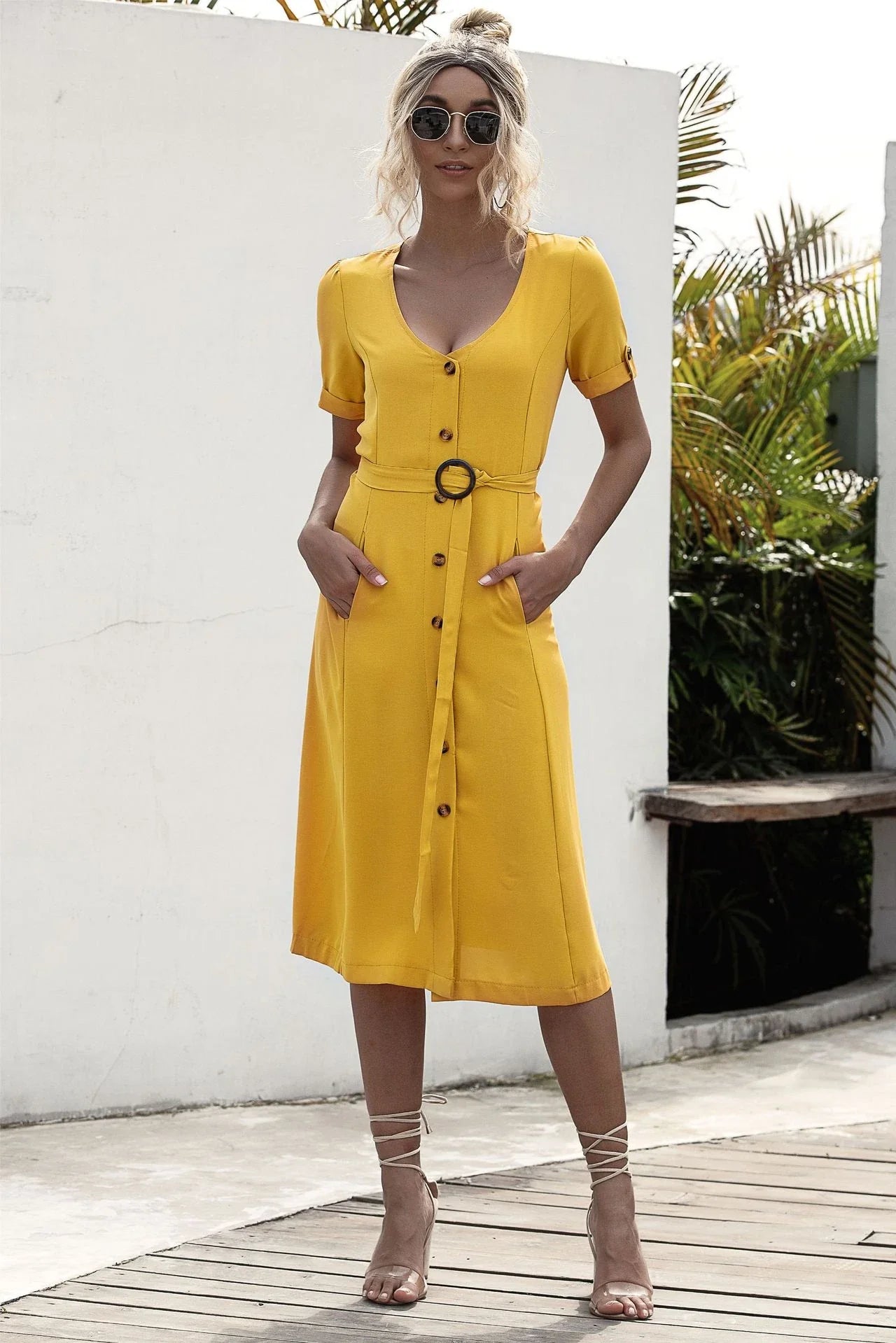 Stylish lace-up button dress in a soft, breathable cotton-blend fabric with a flattering middle waist silhouette