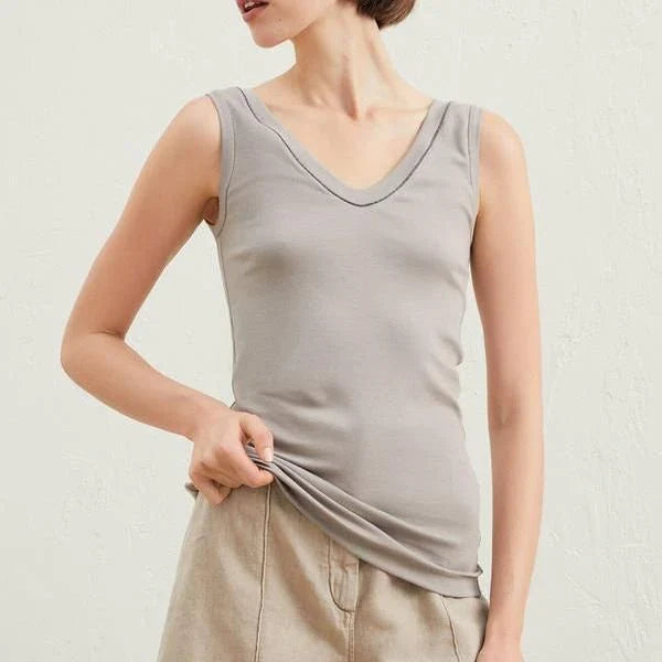 100% wool sleeveless knit vest with delicate beading, available in white colour and multiple sizes