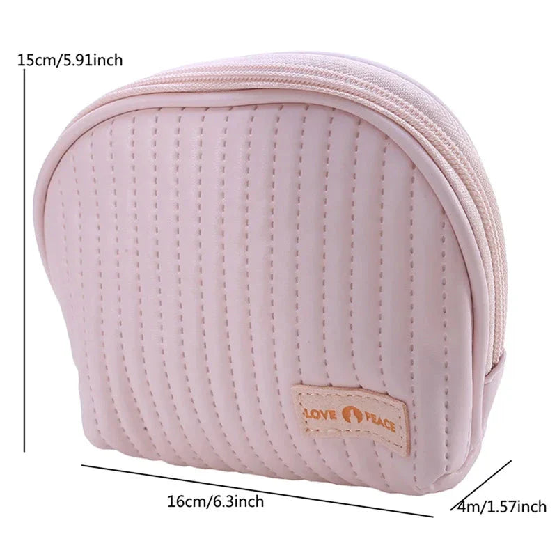 Compact Shell Cosmetic Bag for Women - A stylish and functional makeup pouch for the modern British woman