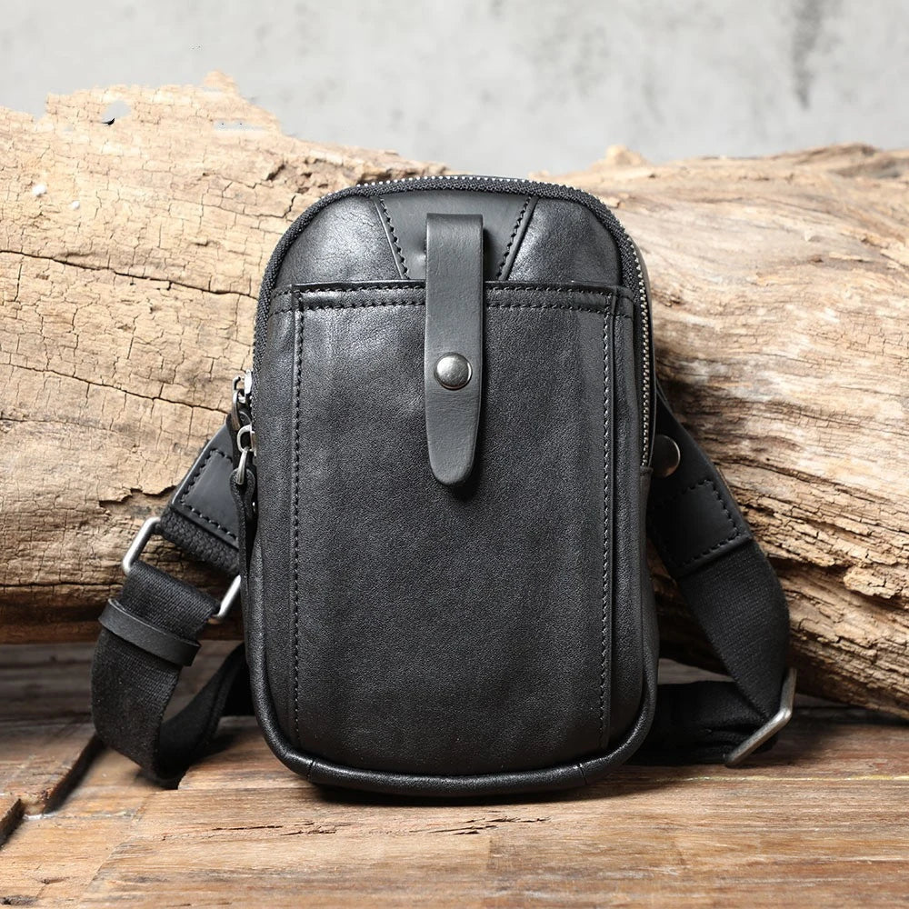 Timeless Leather One-Shoulder Crossbody Bag in Black, featuring premium British cowhide, hands-free design, and organised interior pockets