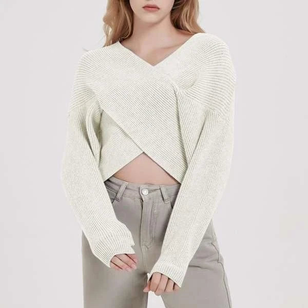 A cosy, brown V-neck knitted jumper with a relaxed, comfortable fit and a touch of vintage-inspired style.