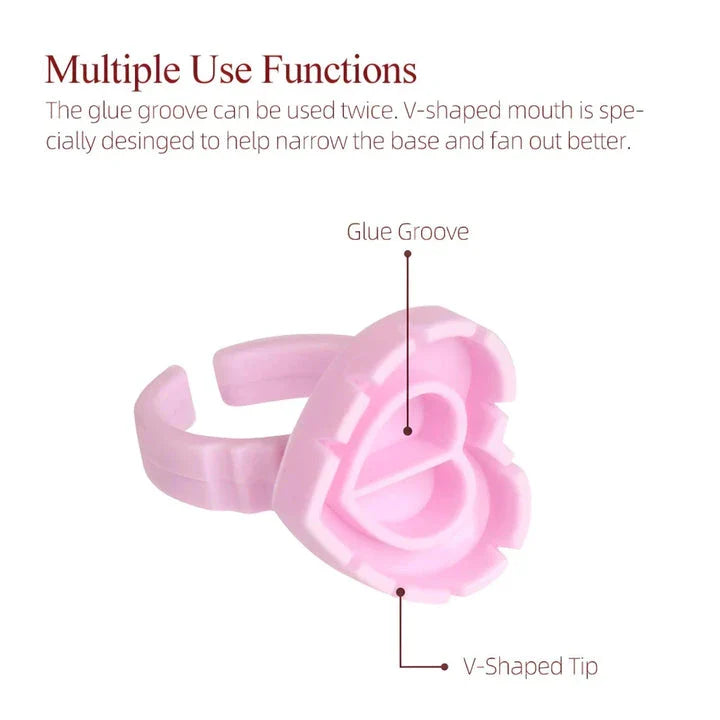 Heart-shaped disposable eyelash glue rings in blue, pink, and white colours