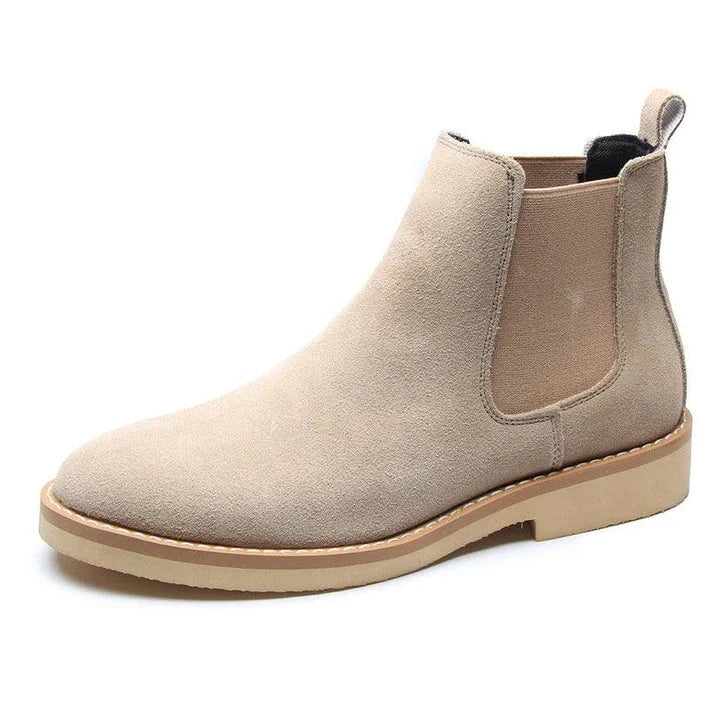 Stylish British-crafted Martin boots with a microfibre upper, pointed toe, and rubber sole for superior comfort and stability.