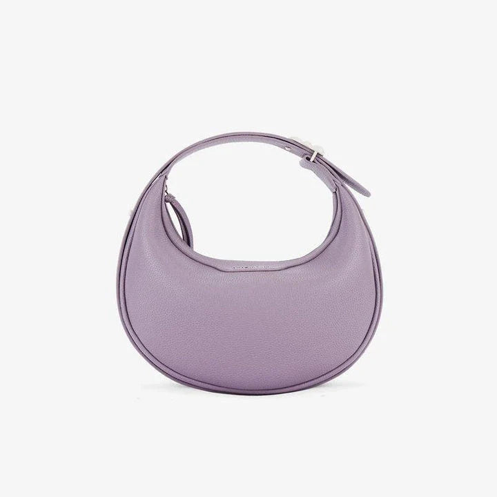 Stylish crescent-shaped leather crossbody bag with soft, supple texture for everyday elegance