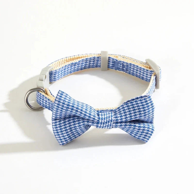 Stylish checkered pet collar with elegant butterfly knot decoration, perfect for dressing up cats and dogs