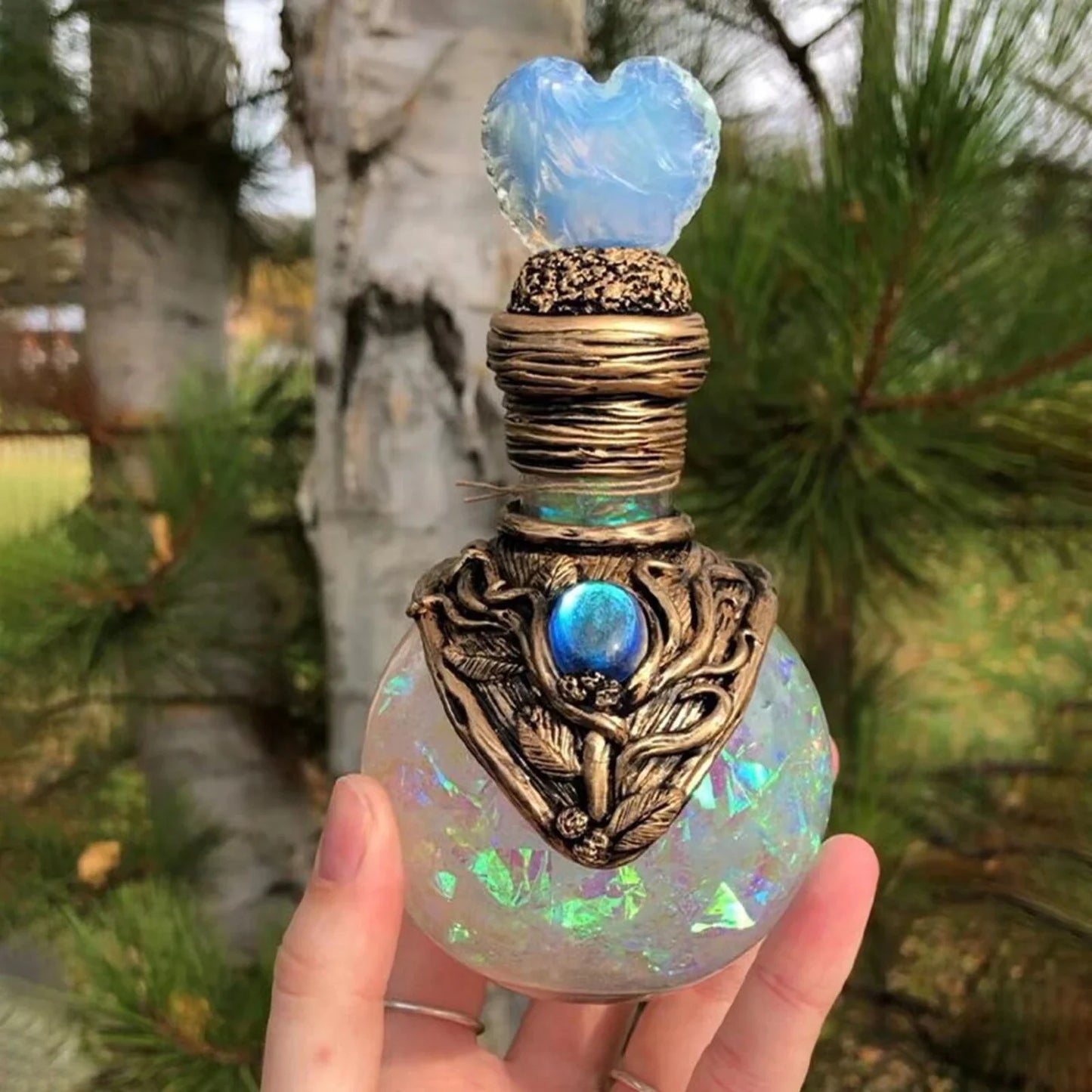 Shimmering resin mermaid bottle with iridescent tail, bathed in moonlight and captivating ambience