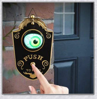 Spooky animated Halloween doorbell with a lifelike glowing green eyeball that peers out and greets guests