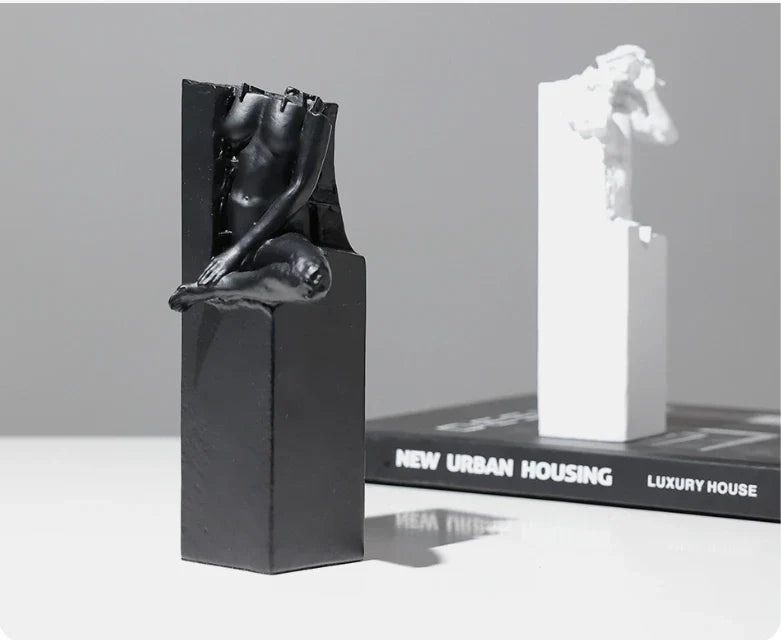 Elegant abstract sculpture in black and white, a minimalist desktop ornament that adds modern art decor to any space