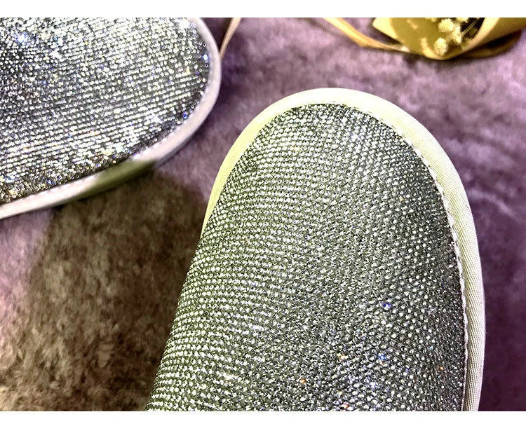 Premium rhinestone-embellished ankle boots for women, featuring a shimmering upper and durable rubber sole for winter wear