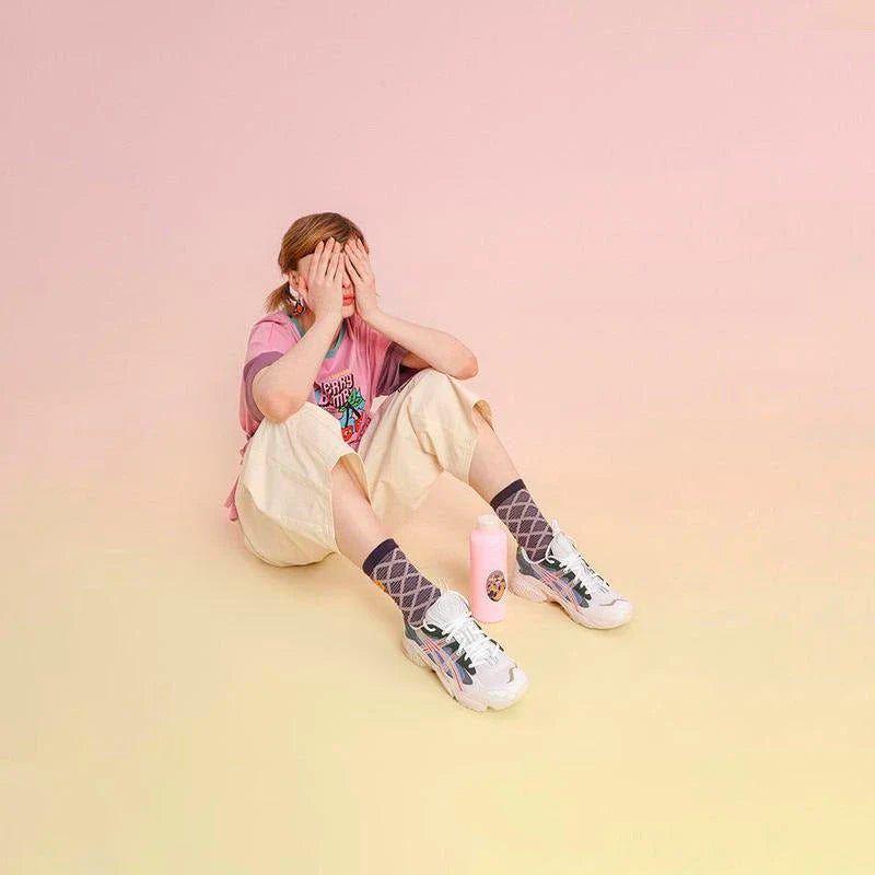 Women's high-waist cotton capri trousers with embroidered fruit designs in a relaxed straight-leg fit