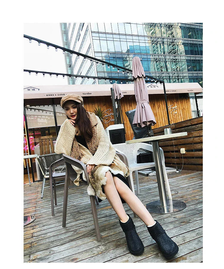 Premium rhinestone-embellished ankle boots for women, featuring a shimmering upper and durable rubber sole for winter wear