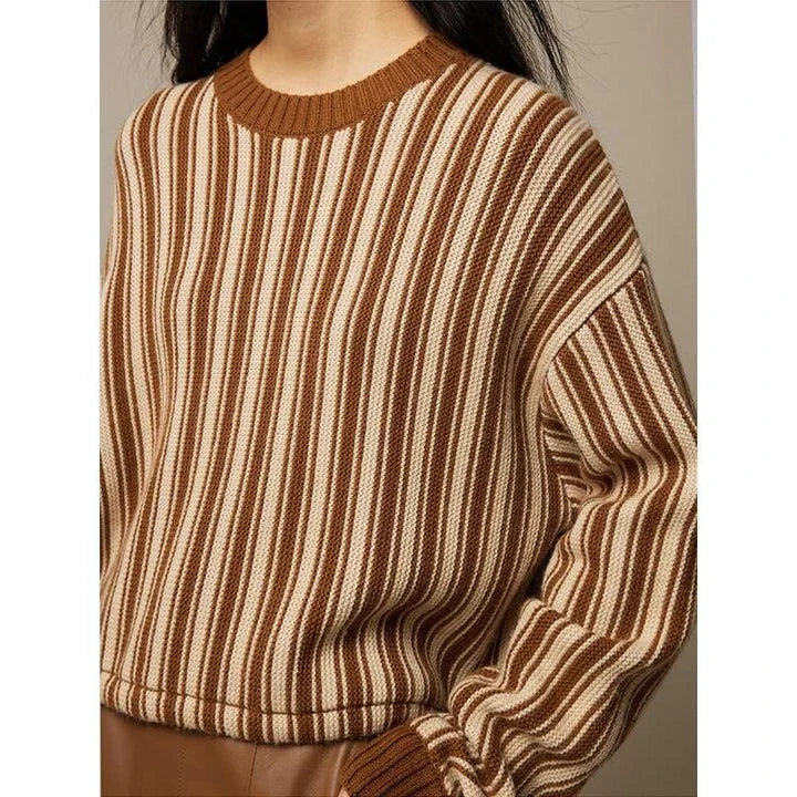 A chic striped wool-blend jumper in black, featuring an elegant O-neck design and a relaxed, flattering fit