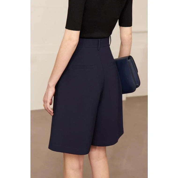 Elegant wide-leg shirred shorts for women, featuring a refined design and comfortable fit for the British summer