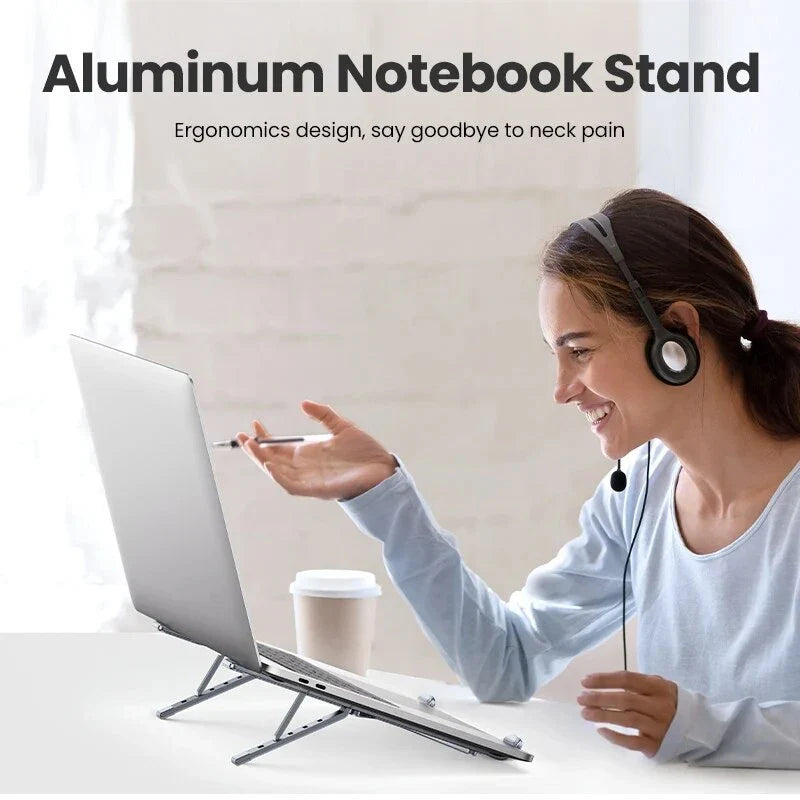 Adjustable and foldable aluminium laptop stand with 5 height levels, cooling design, and skidproof silicone platform
