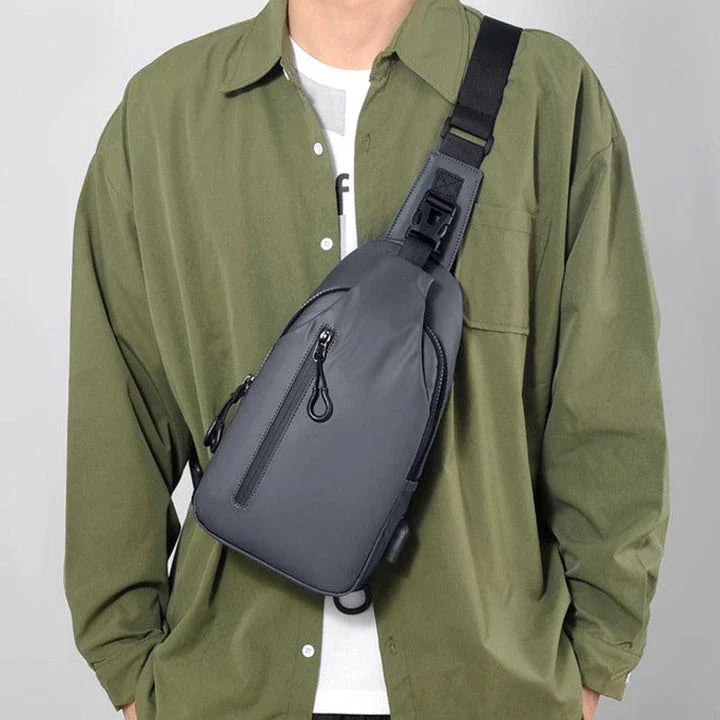 Versatile blue sling crossbody backpack for men with adjustable strap and spacious interior