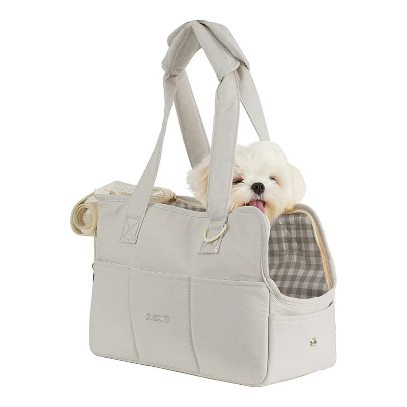 Portable One-Shoulder Pet Carrier Bag made of soft, breathable cotton for comfortable pet travel in the UK