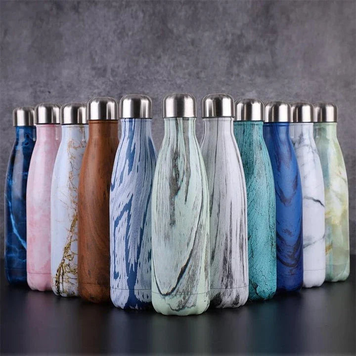 Premium stainless steel water bottle with double-walled vacuum insulation, available in pink colour and 500ml capacity
